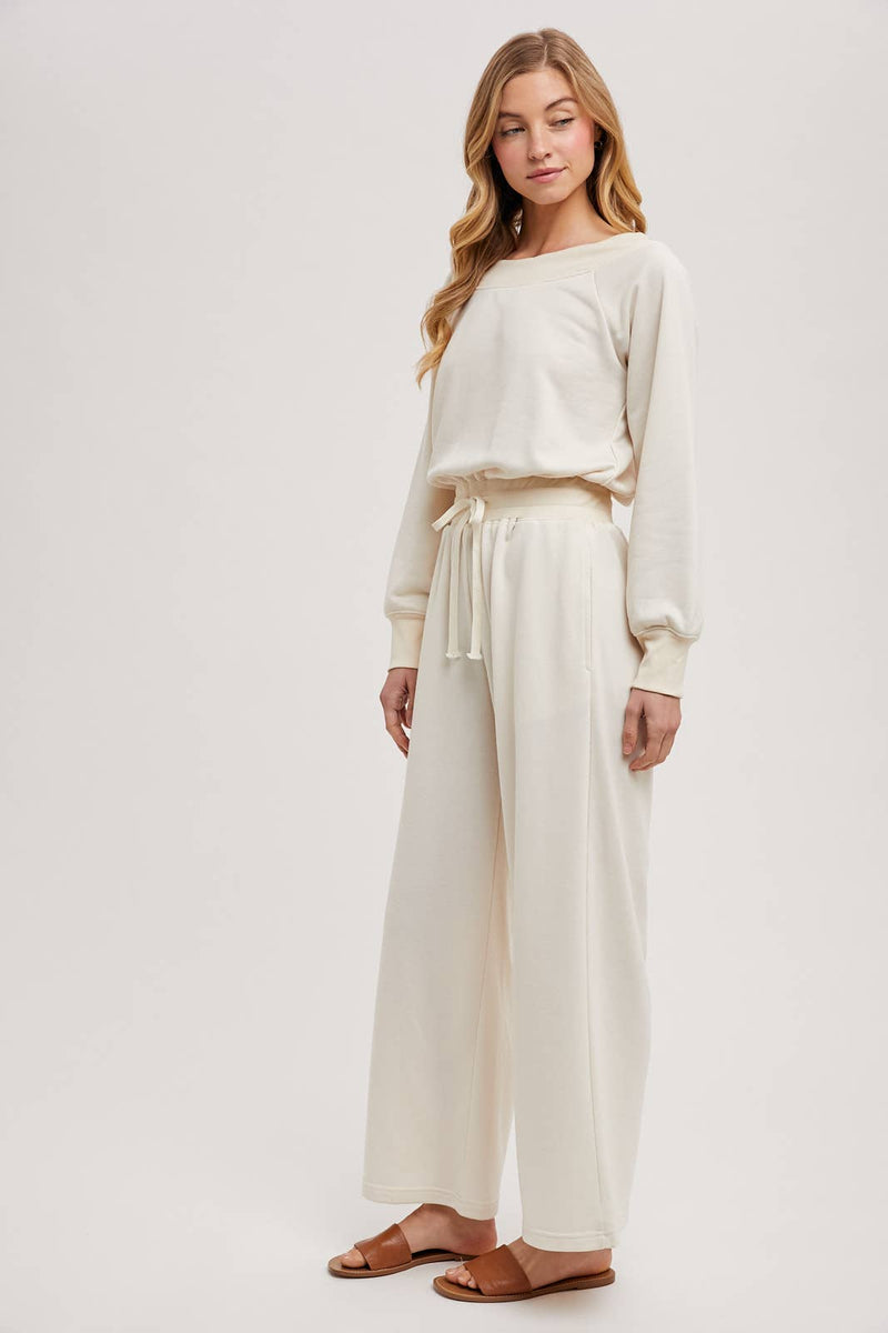 OFF THE SHOULDER JUMPSUIT: