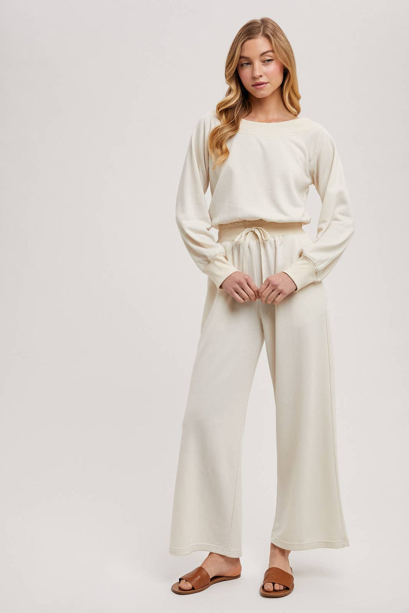 OFF THE SHOULDER JUMPSUIT: