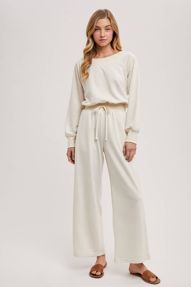 OFF THE SHOULDER JUMPSUIT: