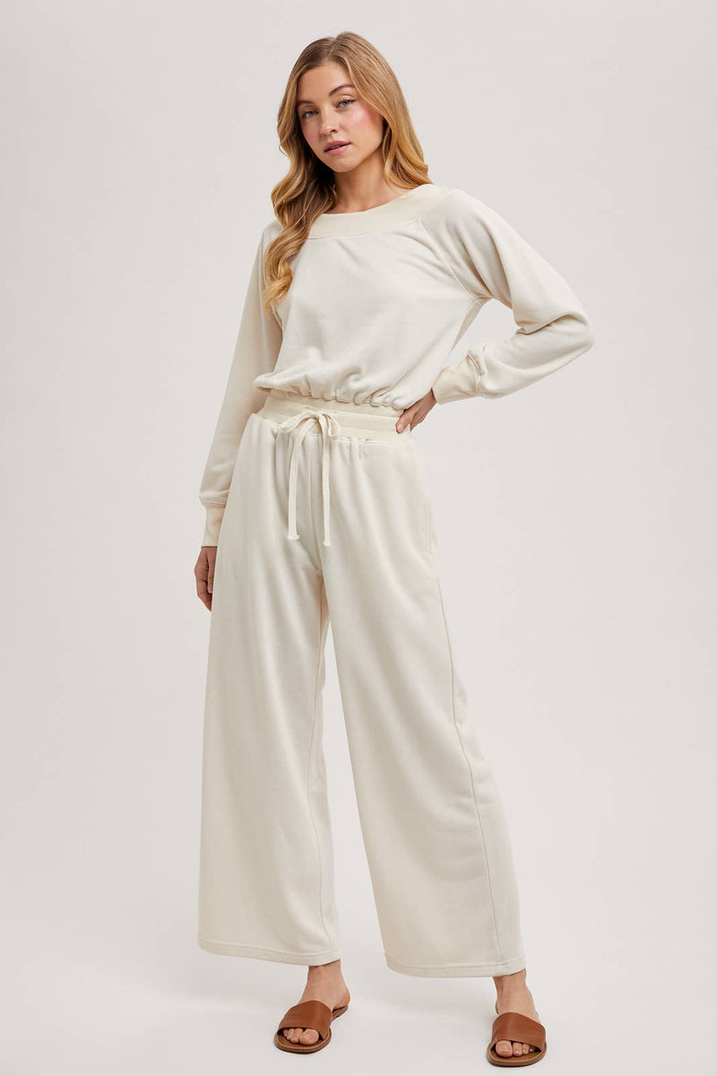 OFF THE SHOULDER JUMPSUIT: