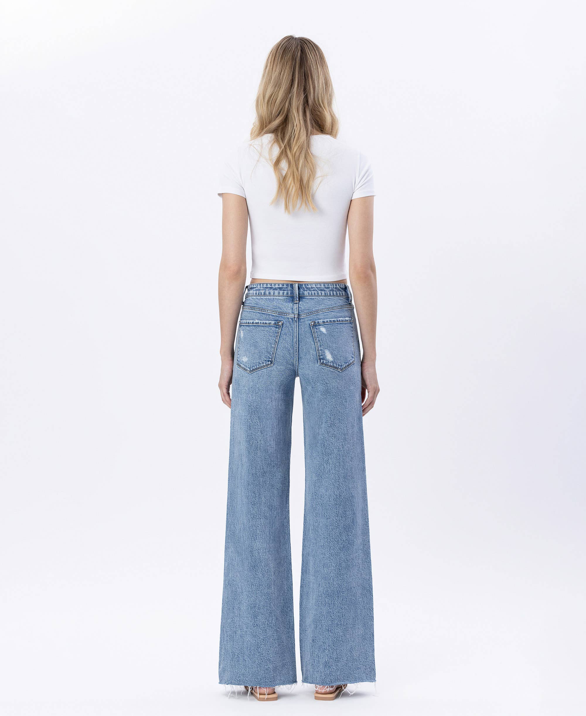 Raw Hem Wide Jeans: Modernity