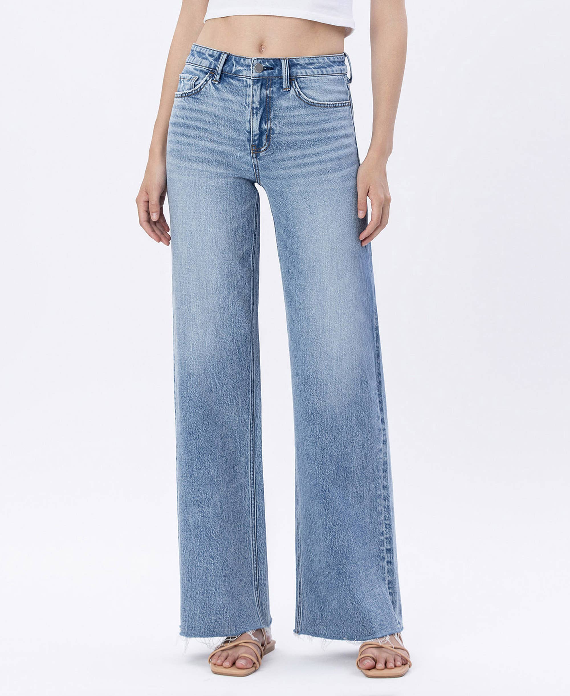 Raw Hem Wide Jeans: Modernity