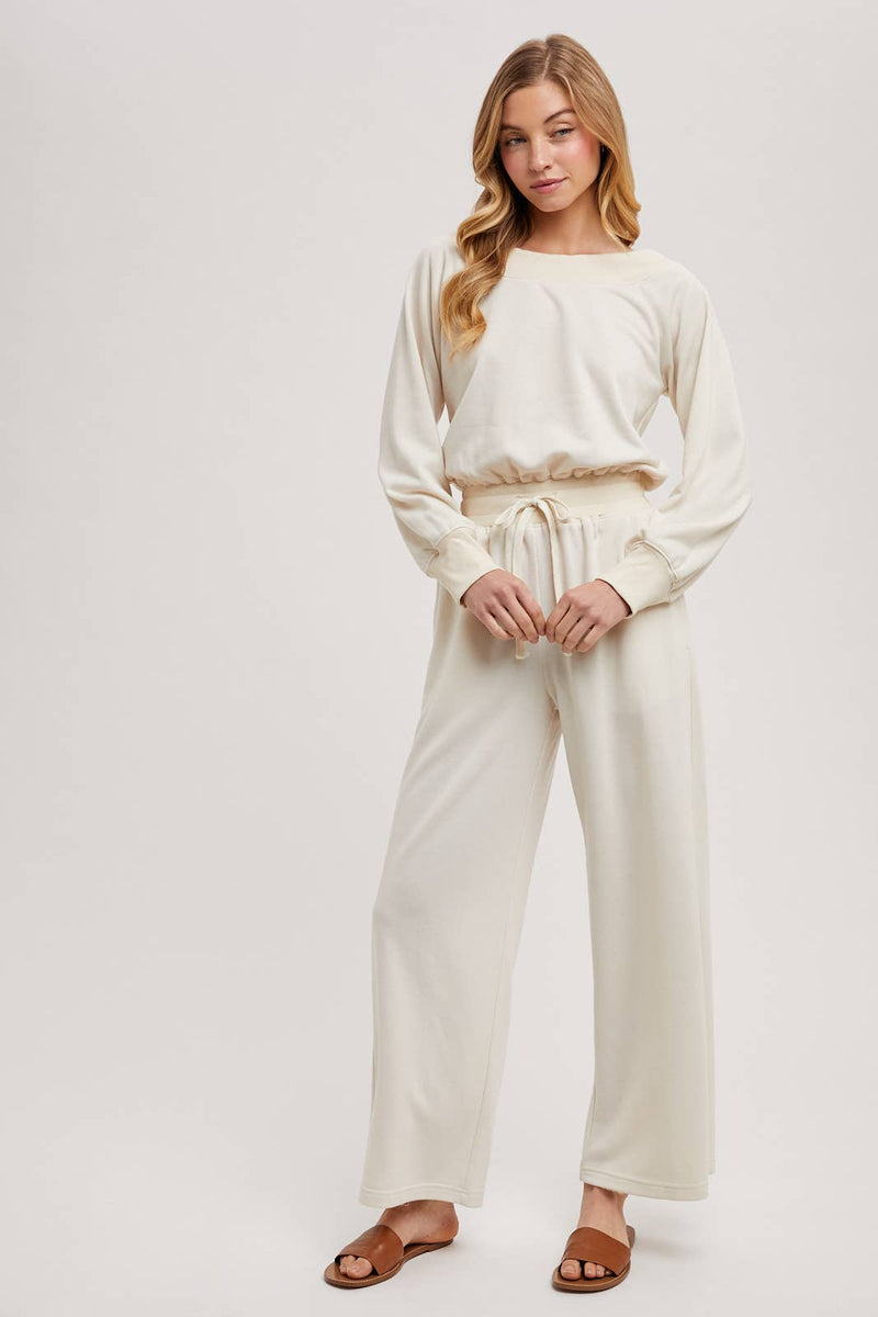 OFF THE SHOULDER JUMPSUIT: