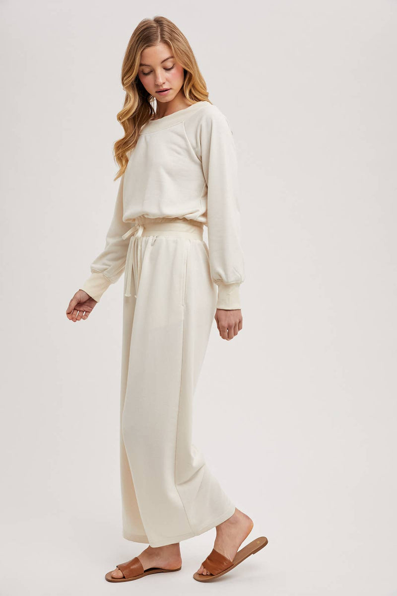 OFF THE SHOULDER JUMPSUIT: