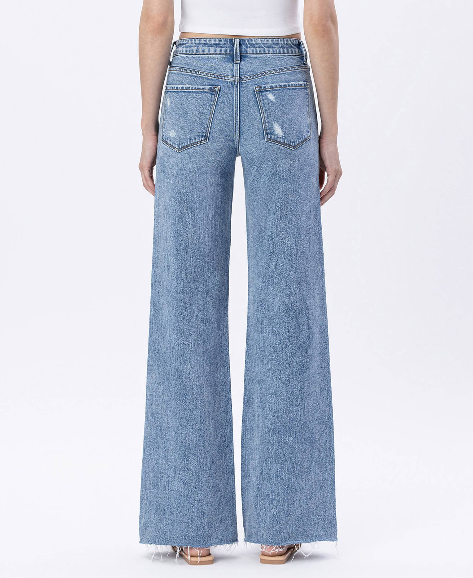 Raw Hem Wide Jeans: Modernity