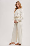 OFF THE SHOULDER JUMPSUIT: