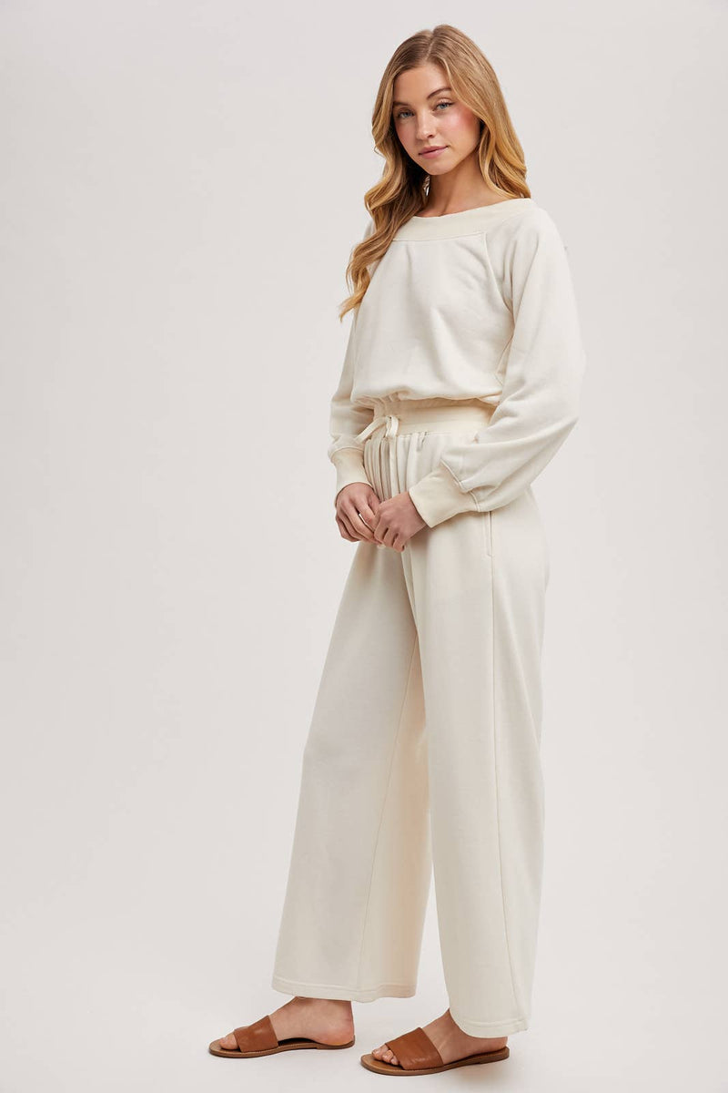 OFF THE SHOULDER JUMPSUIT: